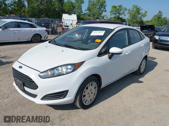 2014 Ford Fiesta S z VIN 3FADP4AJXEM211776, wystawiony jako IAAI lot #42574815 z przebiegiem 174 043 mil mil oraz . Historia ofert i sprzedaży dostępna na DreamBid. Obrazek 17.
