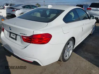 2015 BMW 4 Series 428i with VIN WBA3N7C55FK224583, listed as a IAAI auction lot 41870399 with 29,910 mi miles. Bid and sale history available at carsss.com. Image 4.