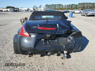 2014 Nissan 370Z Touring with VIN JN1AZ4FH3EM620195, listed as a Copart auction lot 83207104 with 66,974 mi miles and Salvage Title. Bid and sale history available at DreamBid. Image 6.