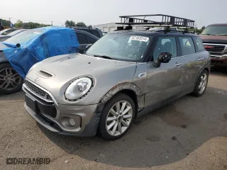 2017 MINI Clubman Cooper S with VIN WMWLU5C55H2F24329, listed as a Copart auction lot 67163314 with 129,818 mi miles and Salvage Title. Bid and sale history available at carsss.com. Image 1.