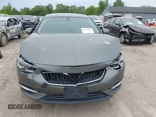 2019 Buick Regal Essence with VIN W04GP6SX6K1009087, listed as a IAAI auction lot 42318056 with 67,460 mi miles and . Bid and sale history available at DreamBid. Image 12.