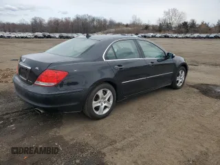 2006 Acura RL with VIN JH4KB16576C003138, listed as a Copart auction lot 52933995 with 176,906 mi miles and Salvage Title. Bid and sale history available at DreamBid. Image 3.