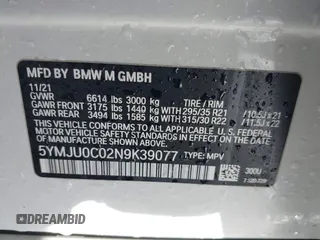 2022 BMW X5 M with VIN 5YMJU0C02N9K39077, listed as a IAAI auction lot 41711996 with 11,875 mi miles. Bid and sale history available at carsss.com. Image 9.