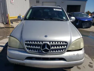 2000 Mercedes-Benz M 320/430/500 with VIN 4JGAB54E7YA151114, listed as a Copart auction lot 50175395 with 166,093 mi miles and Salvage Title. Bid and sale history available at DreamBid. Image 5.