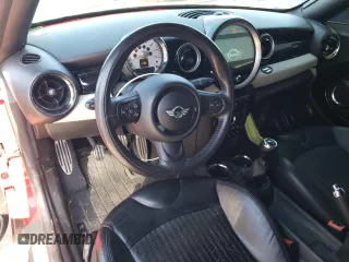 2012 MINI Coupe S z VIN WMWSX3C53CT155140, wystawiony jako Copart lot #75521054 z przebiegiem 65 628 mil mil oraz Szkody całkowita. Historia ofert i sprzedaży dostępna na DreamBid. Obrazek 8.
