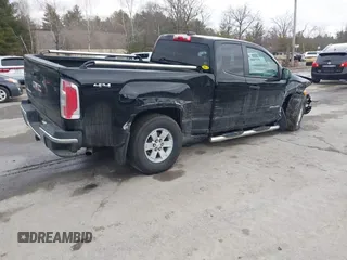 2016 GMC Canyon 4WD SLE with VIN 1GTH6BE30G1388545, listed as a IAAI auction lot 41741212 with 116,972 mi miles. Bid and sale history available at carsss.com. Image 4.