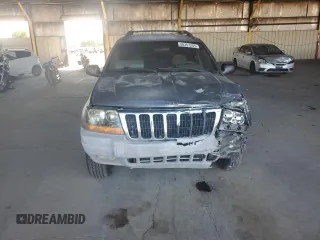 2000 Jeep Grand Cherokee Laredo with VIN 1J4GW48S0YC253091, listed as a Copart auction lot 60357255 with 218,410 mi miles and Clean title. Bid and sale history available at DreamBid. Image 5.