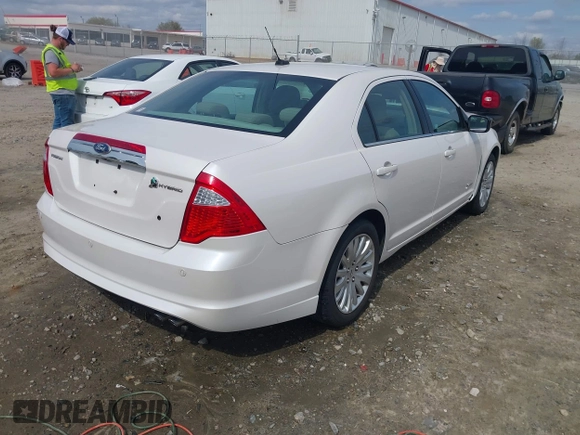 2010 Ford Fusion Hybrid with VIN 3FADP0L33AR392806, listed as a IAAI auction lot 41811194 with 131,627 mi miles. Bid and sale history available at carsss.com. Image 4.