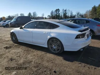 2014 Audi S7 Prestige with VIN WAUW2AFC7EN075619, listed as a Copart auction lot 82359884 with 142,987 mi miles and Salvage Title. Bid and sale history available at carsss.com. Image 2.