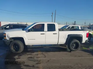 2014 Chevrolet Silverado 1500 Work Truck with VIN 1GCVKPEH2EZ130355, listed as a IAAI auction lot 41406816 with 229,195 mi miles and . Bid and sale history available at DreamBid. Image 14.