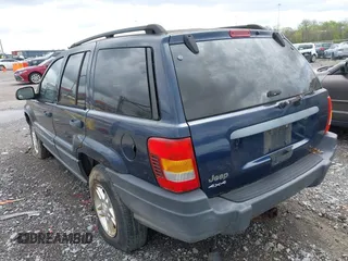 2003 Jeep Grand Cherokee Laredo with VIN 1J4GW48S63C591605, listed as a IAAI auction lot 41973681 with 177,024 mi miles and . Bid and sale history available at DreamBid. Image 3.