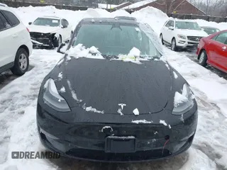 2023 Tesla Model Y Performance with VIN 7SAYGDEF4PF797192, listed as a IAAI auction lot 41550259 with 13,312 mi miles and . Bid and sale history available at DreamBid. Image 12.