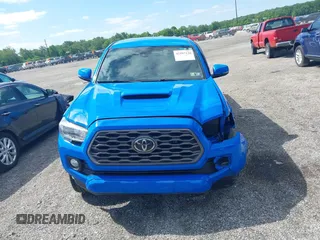 2021 Toyota Tacoma SR z VIN 3TMCZ5AN8MM374398, wystawiony jako IAAI lot #42297138 z przebiegiem 87 205 mil mil oraz . Historia ofert i sprzedaży dostępna na DreamBid. Obrazek 12.