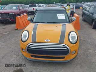 2015 MINI Hardtop with VIN WMWXM5C58FT942888, listed as a IAAI auction lot 42226391 with 61,935 mi miles and . Bid and sale history available at DreamBid. Image 6.