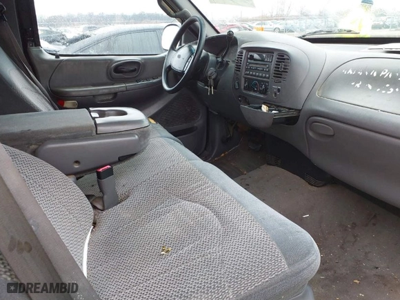 2000 Ford F-150 XL with VIN 1FTRX18LXYNA76850, listed as a IAAI auction lot 41384438 with 167,471 mi miles. Bid and sale history available at carsss.com. Image 5.