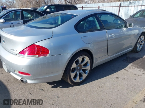 2006 BMW 6 Series 650Ci with VIN WBAEH13456CR49065, listed as a IAAI auction lot 41840327 with 128,451 mi miles. Bid and sale history available at carsss.com. Image 4.
