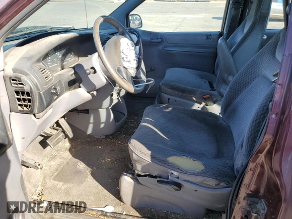 2000 Plymouth Voyager z VIN 2P4FP25B4YR645789, wystawiony jako Copart lot #79094354 z przebiegiem 169 988 mil mil oraz Szkody całkowita. Historia ofert i sprzedaży dostępna na DreamBid. Obrazek 7.