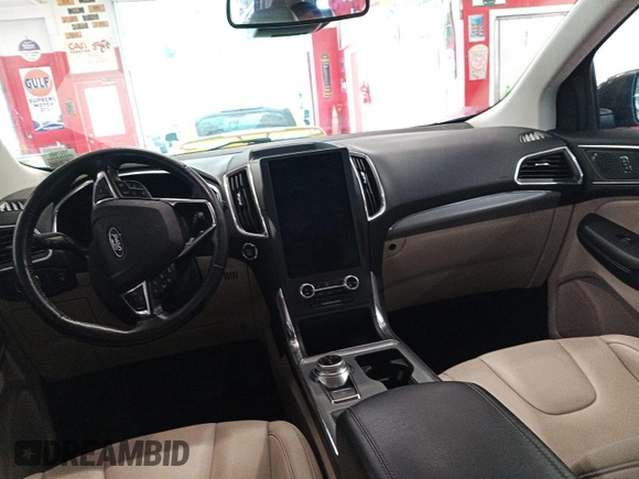 2021 Ford Edge Titanium with VIN 2FMPK4K95MBA50355, listed as a IAAI auction lot 42821253 with 109,191 mi miles and . Bid and sale history available at DreamBid. Image 41.
