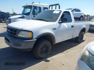 1997 Ford F-150 with VIN 1FTDF18W1VKC71272, listed as a IAAI auction lot 42736151 with 160,730 mi miles and . Bid and sale history available at DreamBid. Image 2.
