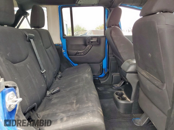 2015 Jeep Wrangler Unlimited Sport с VIN 1C4HJWDG2FL528687, выставлен на аукционе Copart как лот 59174625 с пробегом 87 285 миль миль и На запчасти • Non repairable. История ставок и продаж доступна на DreamBid. Изображение 11.