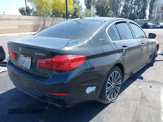 2018 BMW 5 Series 530e with VIN WBAJA9C50JB249995, listed as a IAAI auction lot 42301414 with 179,673 mi miles and . Bid and sale history available at DreamBid. Image 4.