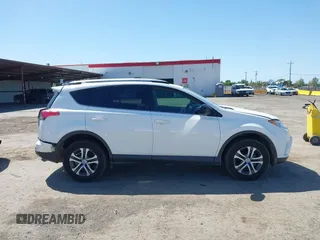 2017 Toyota RAV4 LE with VIN JTMBFREV9HJ147391, listed as a IAAI auction lot 41993617 with 90,666 mi miles. Bid and sale history available at carsss.com. Image 13.