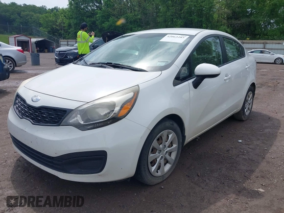 2013 Kia Rio LX with VIN KNADM4A39D6318169, listed as a IAAI auction lot 42063285 with 138,272 mi miles and . Bid and sale history available at DreamBid. Image 2.