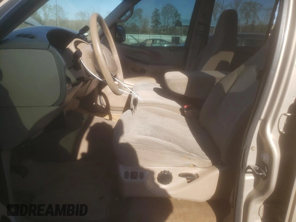 1997 Ford Expedition XLT with VIN 1FMEU1769VLC38411, listed as a Copart auction lot 50315135 with 230,863 mi miles and Salvage title. Bid and sale history available at DreamBid. Image 7.
