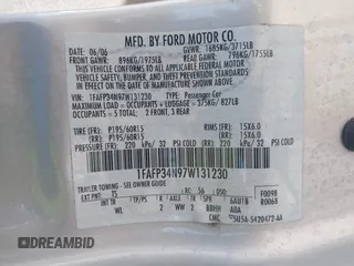 2007 Ford Focus S with VIN 1FAFP34N97W131230, listed as a IAAI auction lot 42661651 with 221,807 mi miles and . Bid and sale history available at DreamBid. Image 9.