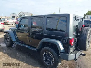 2013 Jeep Wrangler Unlimited Freedom Edition with VIN 1C4BJWDG8DL648870, listed as a IAAI auction lot 41909372 with 184,203 mi miles. Bid and sale history available at carsss.com. Image 3.