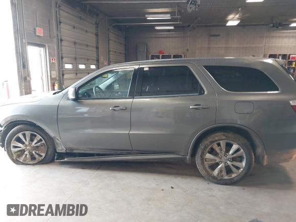 2012 Dodge Durango R/T z VIN 1C4SDJCT2CC169951, wystawiony jako IAAI lot #42012202 z przebiegiem 278 670 mil mil oraz . Historia ofert i sprzedaży dostępna na DreamBid. Obrazek 14.