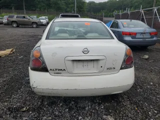 2003 Nissan Altima S z VIN 1N4AL11D23C170243, wystawiony jako Copart lot #60780585 z przebiegiem Nie podano mil oraz Szkoda całkowita • Salvage title. Historia ofert i sprzedaży dostępna na DreamBid. Obrazek 6.
