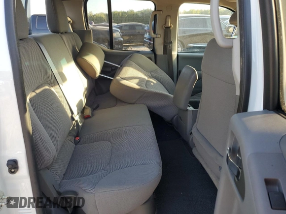 2019 Nissan Frontier Desert Runner z VIN 1N6DD0ER3KN752338, wystawiony jako Copart lot #73179324 z przebiegiem 126 955 mil mil oraz Szkoda całkowita • Salvage title. Historia ofert i sprzedaży dostępna na DreamBid. Obrazek 11.