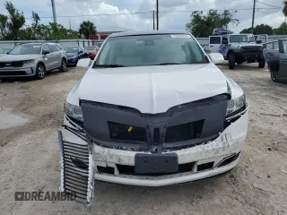 2014 Lincoln MKT with VIN 2LMHJ5FK5EBL57377, listed as a Copart auction lot 70608694 with 115,053 mi miles and Salvage Title. Bid and sale history available at DreamBid. Image 5.