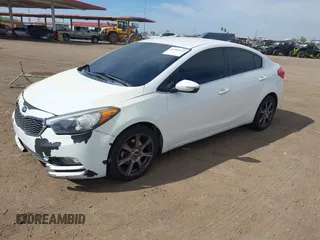 2014 Kia Forte EX with VIN KNAFX4A89E5232153, listed as a IAAI auction lot 41902512 with 133,978 mi miles. Bid and sale history available at carsss.com. Image 2.