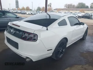 2013 Ford Mustang V6 with VIN 1ZVBP8AM8D5206791, listed as a IAAI auction lot 41156172 with 97,169 mi miles. Bid and sale history available at carsss.com. Image 4.