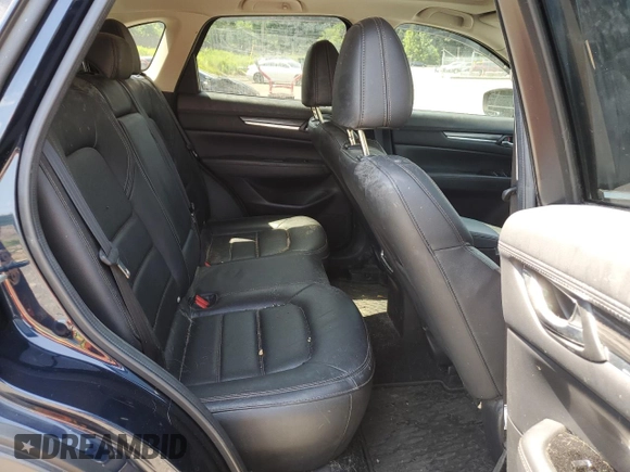 2018 Mazda CX-5 Grand Touring with VIN JM3KFBDM8J0342272, listed as a Copart auction lot 61930115 with 119,727 mi miles and Salvage title. Bid and sale history available at DreamBid. Image 11.
