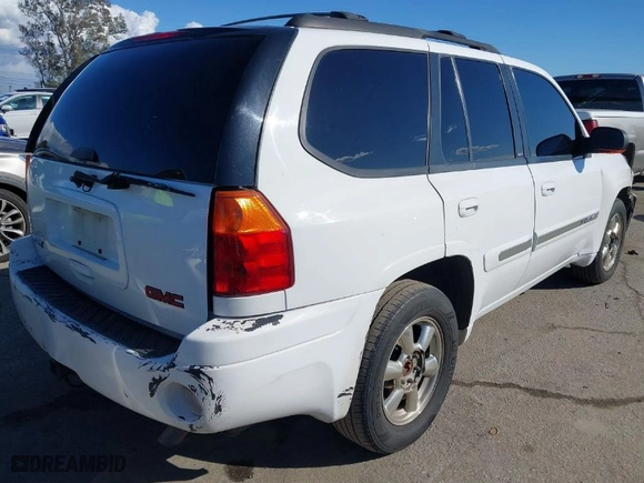 2002 GMC Envoy SLT with VIN 1GKDS13S522216498, listed as a IAAI auction lot 41642757 with 164,981 mi miles. Bid and sale history available at carsss.com. Image 4.