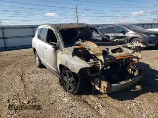 2010 Jeep Compass Sport with VIN 1J4NF4FB1AD672772, listed as a Copart auction lot 74220304 with 0 mi miles and Salvage Title. Bid and sale history available at carsss.com. Image 11.