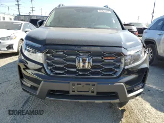 2024 Honda Passport TrailSport z VIN 5FNYF8H67RB010869, wystawiony jako Copart lot #50761425 z przebiegiem 5 720 mil mil oraz Szkoda całkowita • Salvage title. Historia ofert i sprzedaży dostępna na DreamBid. Obrazek 5.
