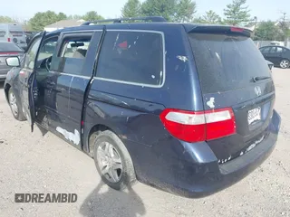 2005 Honda Odyssey EX with VIN 5FNRL38455B135555, listed as a IAAI auction lot 42080079 with 149,468 mi miles and . Bid and sale history available at carsss.com. Image 3.