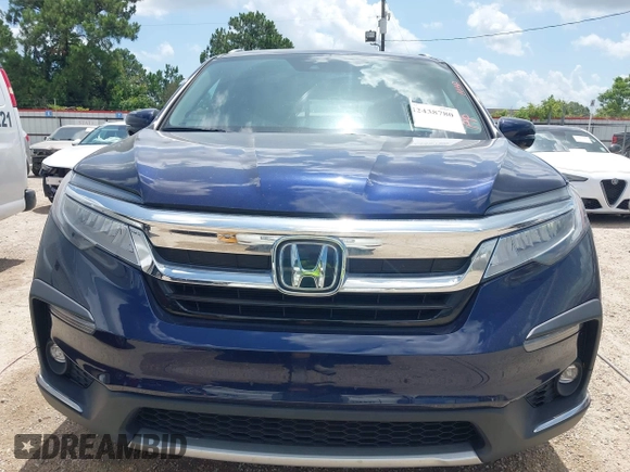 2022 Honda Pilot Touring 7-Passenger with VIN 5FNYF5H61NB019768, listed as a IAAI auction lot 42438780 with Not provided miles and . Bid and sale history available at DreamBid. Image 13.