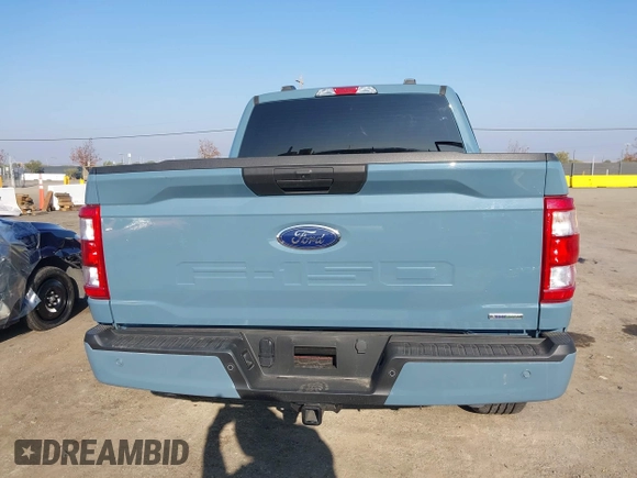 2023 Ford F-150 XL with VIN 1FTEW1EP4PKF58559, listed as a IAAI auction lot 40953057 with 7,900 mi miles. Bid and sale history available at carsss.com. Image 17.