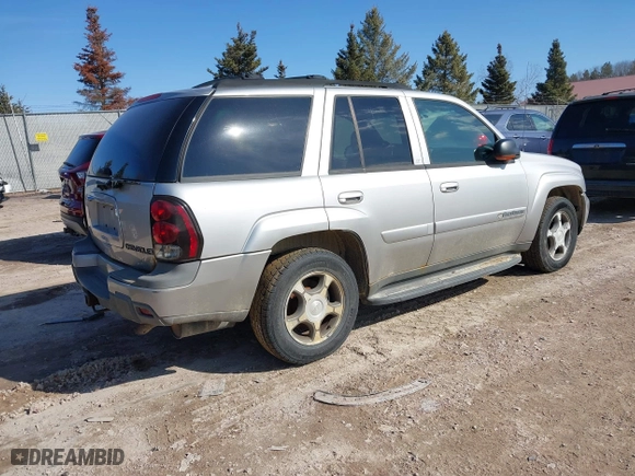 2004 Chevrolet TrailBlazer LS with VIN 1GNDT13S442119957, listed as a IAAI auction lot 41760671 with 233,032 mi miles. Bid and sale history available at carsss.com. Image 4.