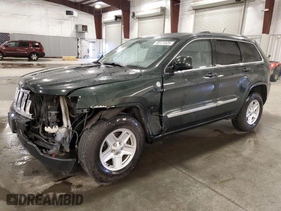 2011 Jeep Grand Cherokee 70th Anniversary with VIN 1J4RR4GT3BC736981, listed as a Copart auction lot 49171525 with 127,438 mi miles and Salvage Title. Bid and sale history available at carsss.com. Image 1.