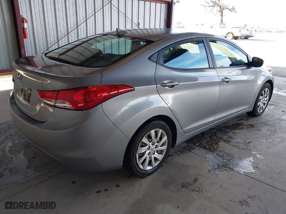 2012 Hyundai Elantra GLS PZEV with VIN KMHDH4AE5CU235756, listed as a IAAI auction lot 41312506 with 118,621 mi miles. Bid and sale history available at carsss.com. Image 4.