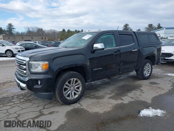 2015 GMC Canyon 4WD SLT with VIN 1GTG6CE39F1238269, listed as a IAAI auction lot 41327897 with 155,663 mi miles. Bid and sale history available at carsss.com. Image 17.