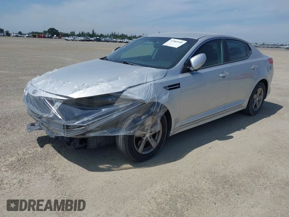 2015 Kia Optima LX with VIN 5XXGM4A74FG381316, listed as a IAAI auction lot 41885940 with 128,984 mi miles. Bid and sale history available at carsss.com. Image 2.