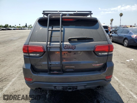 2019 Jeep Grand Cherokee Trailhawk z VIN 1C4RJFLG6KC759527, wystawiony jako Copart lot #64862645 z przebiegiem 76 079 mil mil oraz Szkoda całkowita • Salvage title. Historia ofert i sprzedaży dostępna na DreamBid. Obrazek 6.