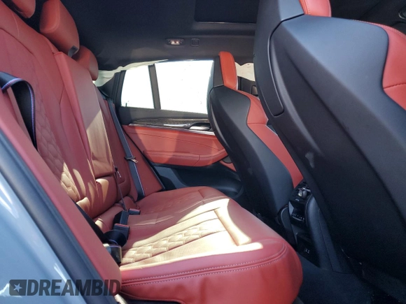 2024 BMW X4 M z VIN 5YM23EC01R9W18369, wystawiony jako Copart lot #82886254 z przebiegiem Nie podano mil oraz Szkoda całkowita • Salvage title. Historia ofert i sprzedaży dostępna na DreamBid. Obrazek 11.